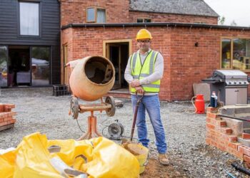 Contractor remodeling the home exterior | Premium Photo - rawpixel