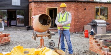 Contractor remodeling the home exterior | Premium Photo - rawpixel