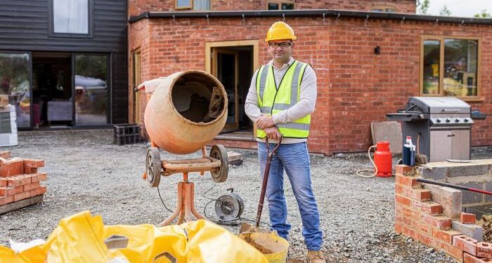 Contractor remodeling the home exterior | Premium Photo - rawpixel